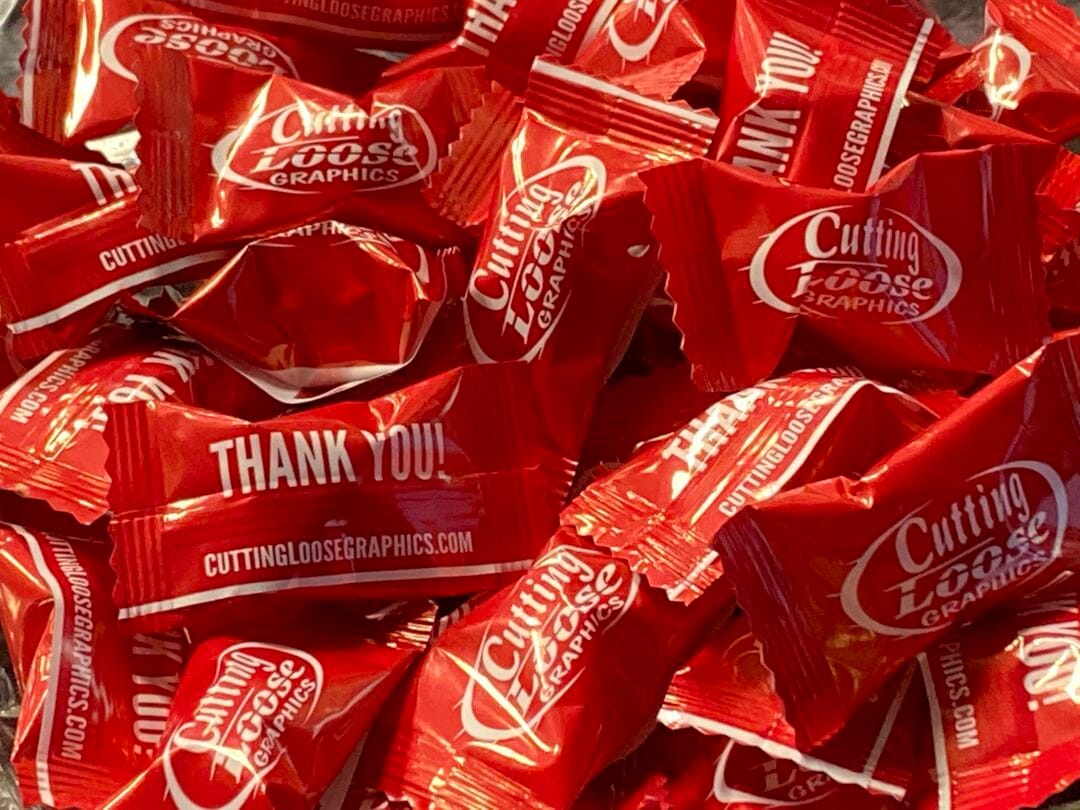 A close up of a bowl of Custom Printed Promotional Mints by Cutting Loose Graphics of Joplin Mo