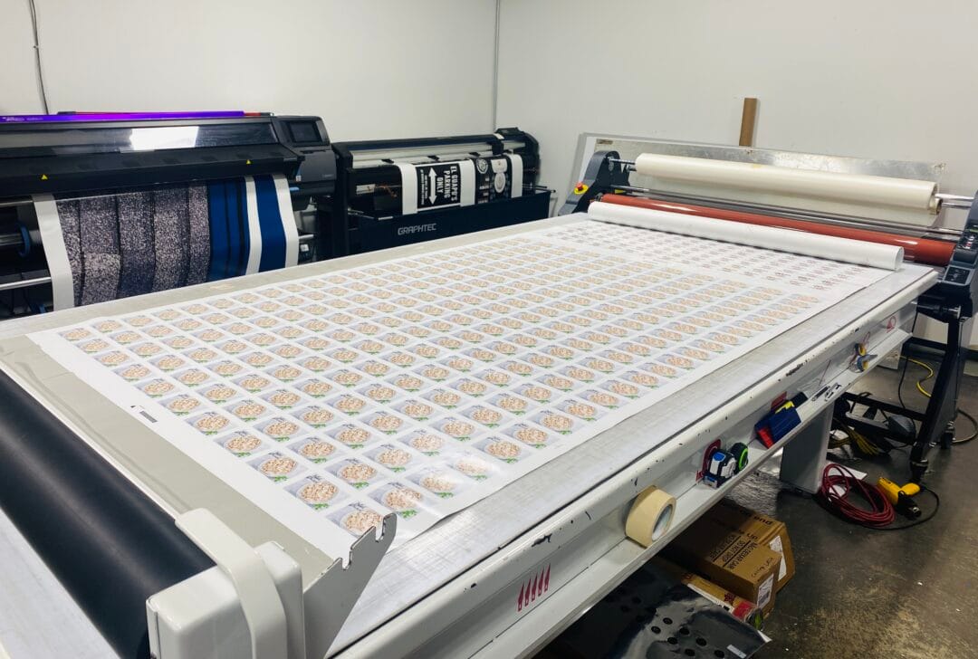 Pictured here is a behind-the-scenes look at the Cutting Loose Graphics production area.