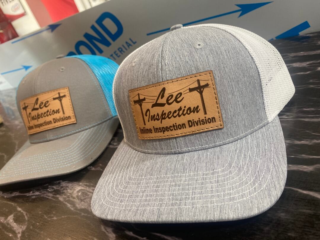 Pictured here are leather patch hats we created for Lee Inspection