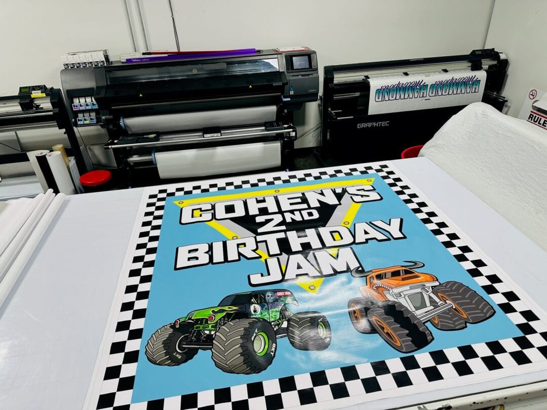 A big, bold banner that says " COHEN'S 2nd BIRTHDAY JAM"