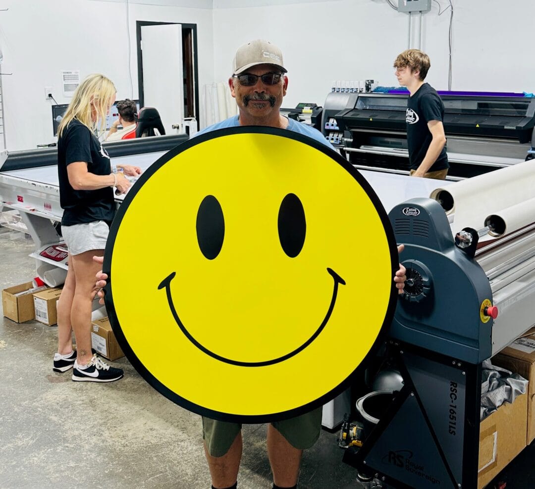 Here’s a custom round yellow smiley face sign we made for our good friend Frank.